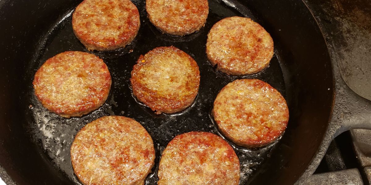 sausage in a cast iron pan