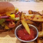 bacon cheese burger and french fries