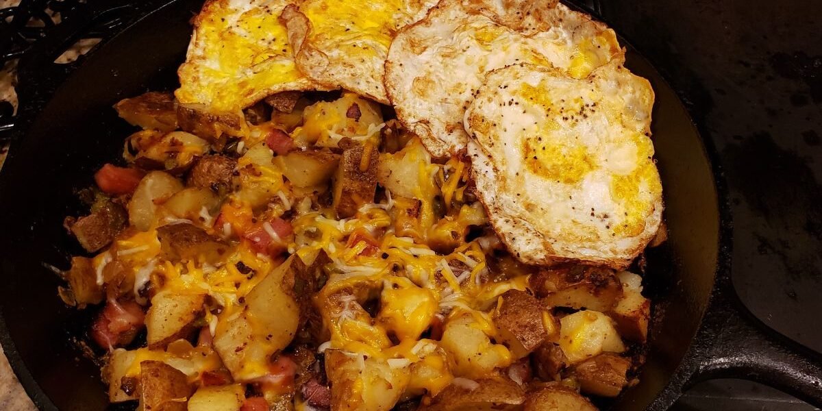 ham hash with cheese and fried eggs