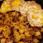 ham hash with cheese and fried eggs
