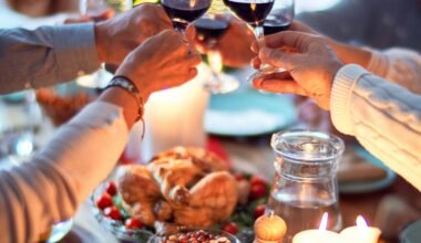 woman in white long sleeve shirt holding wine glass